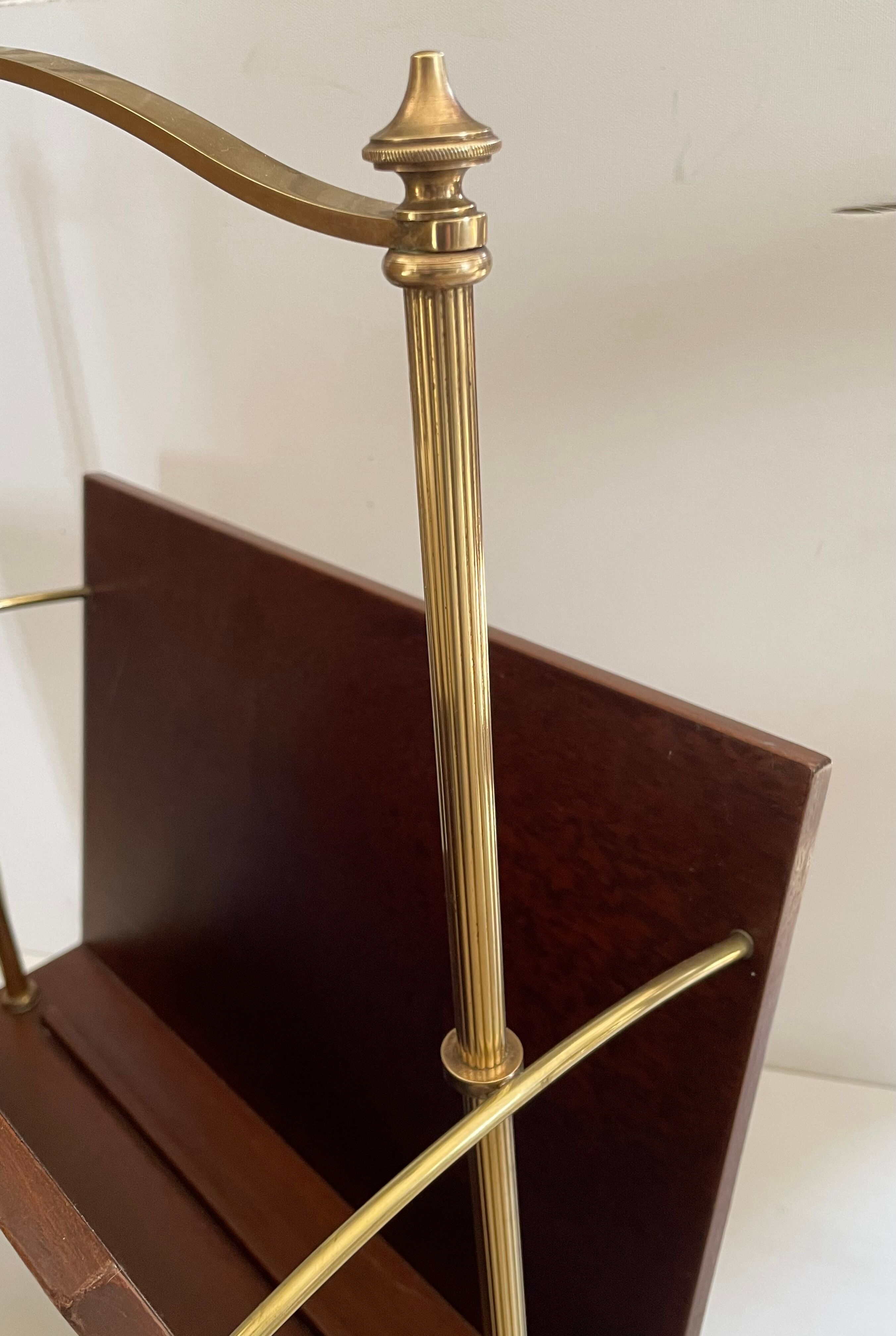 Magazine racks with claw feet by Maison Jansen