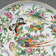 Porcelain plate of Canton XIXth decoration of butterflies and bird