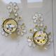 pair of floral wall lights from the 60s-70s