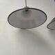 Pair of enamelled sheet metal suspensions