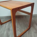 Sled-shaped side table