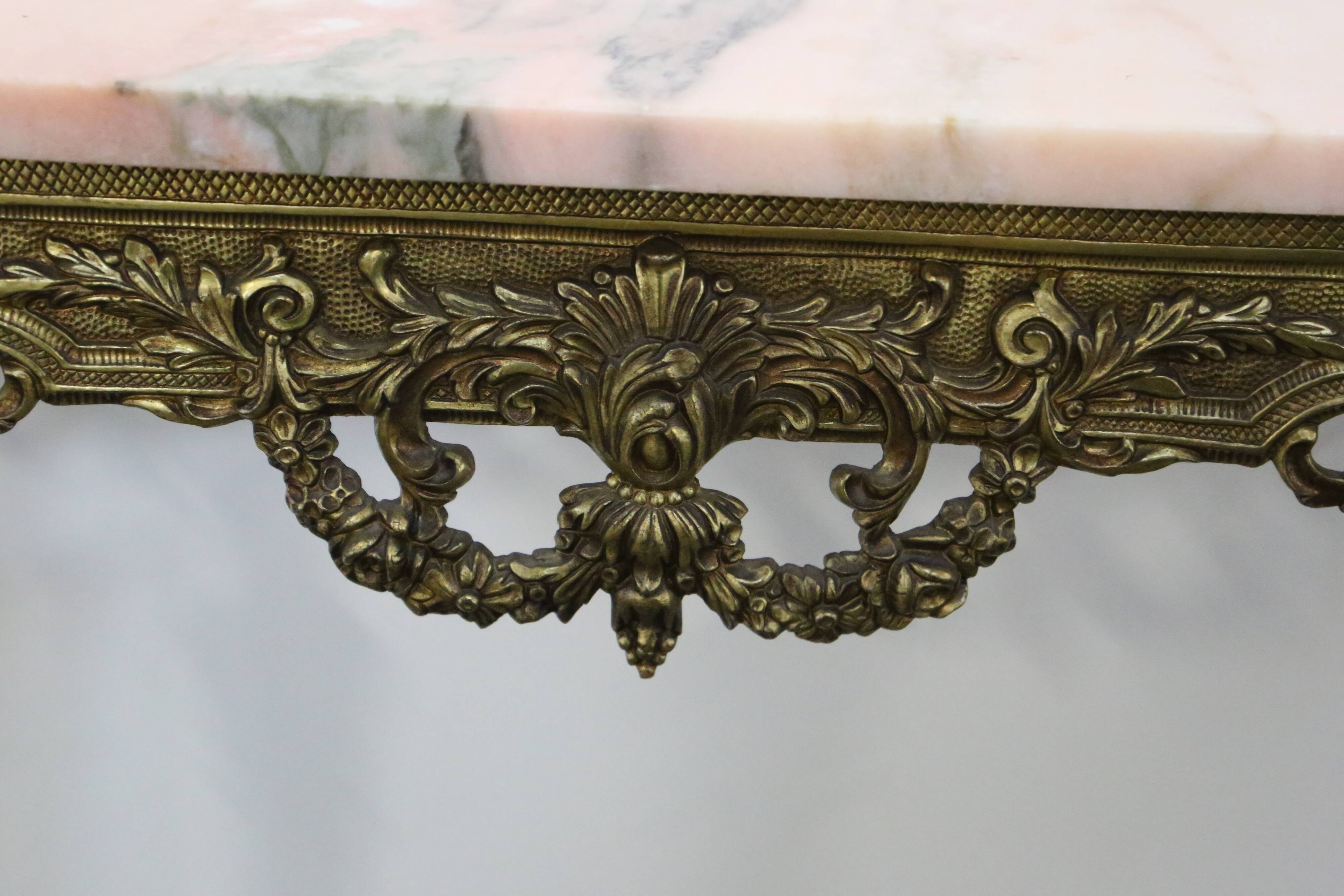 Console in brass and pink alabaster