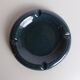 Round ashtray in speckled green ceramic