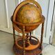 Globe bar on wheels with a rotating tray