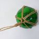 Boule, flotteur en verre vert vintage