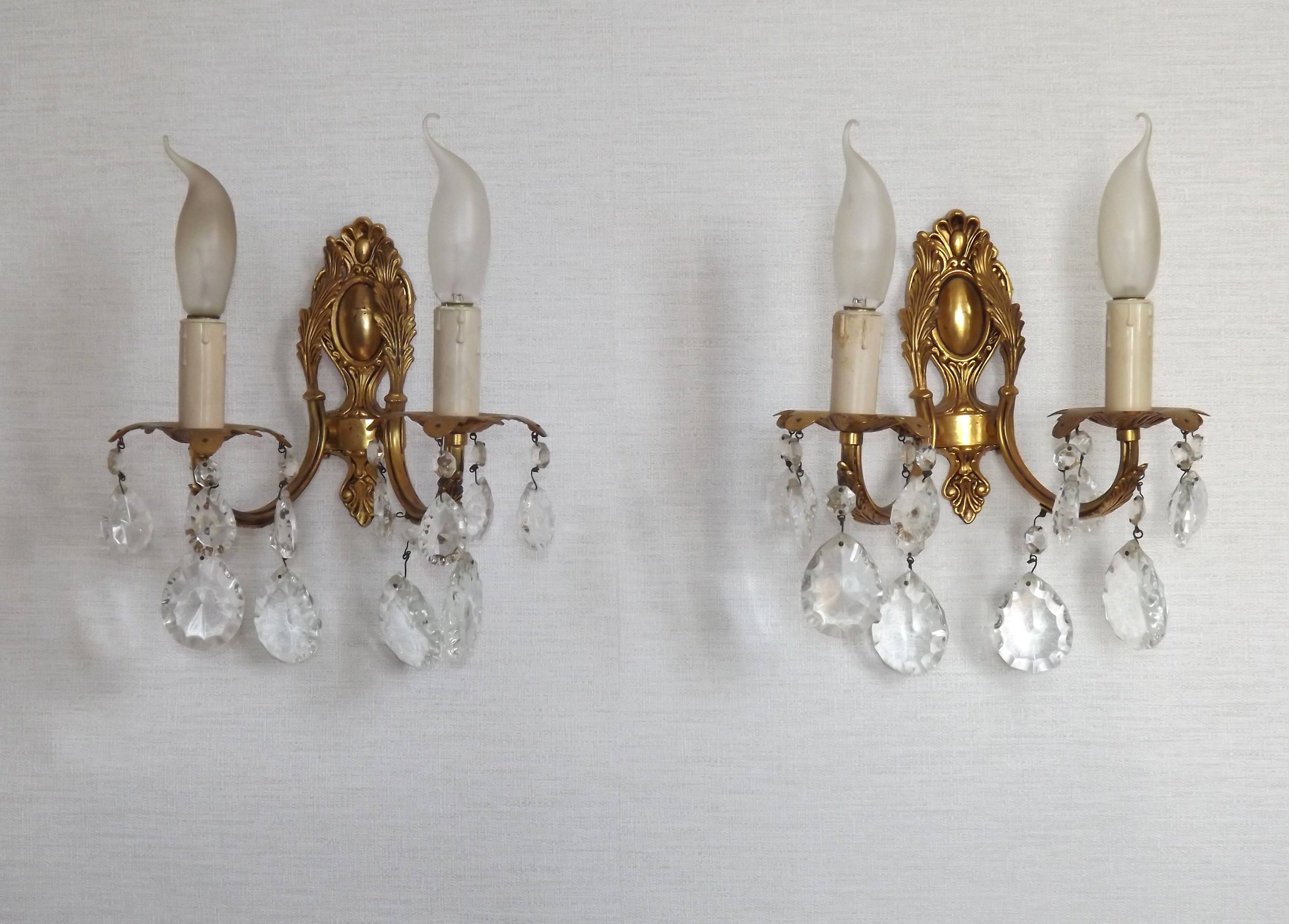 Pair of antique 2-light wall sconces in bronze with crystal pendants, Spain.