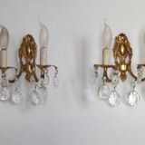 Pair of antique 2-light wall sconces in bronze with crystal pendants, Spain.