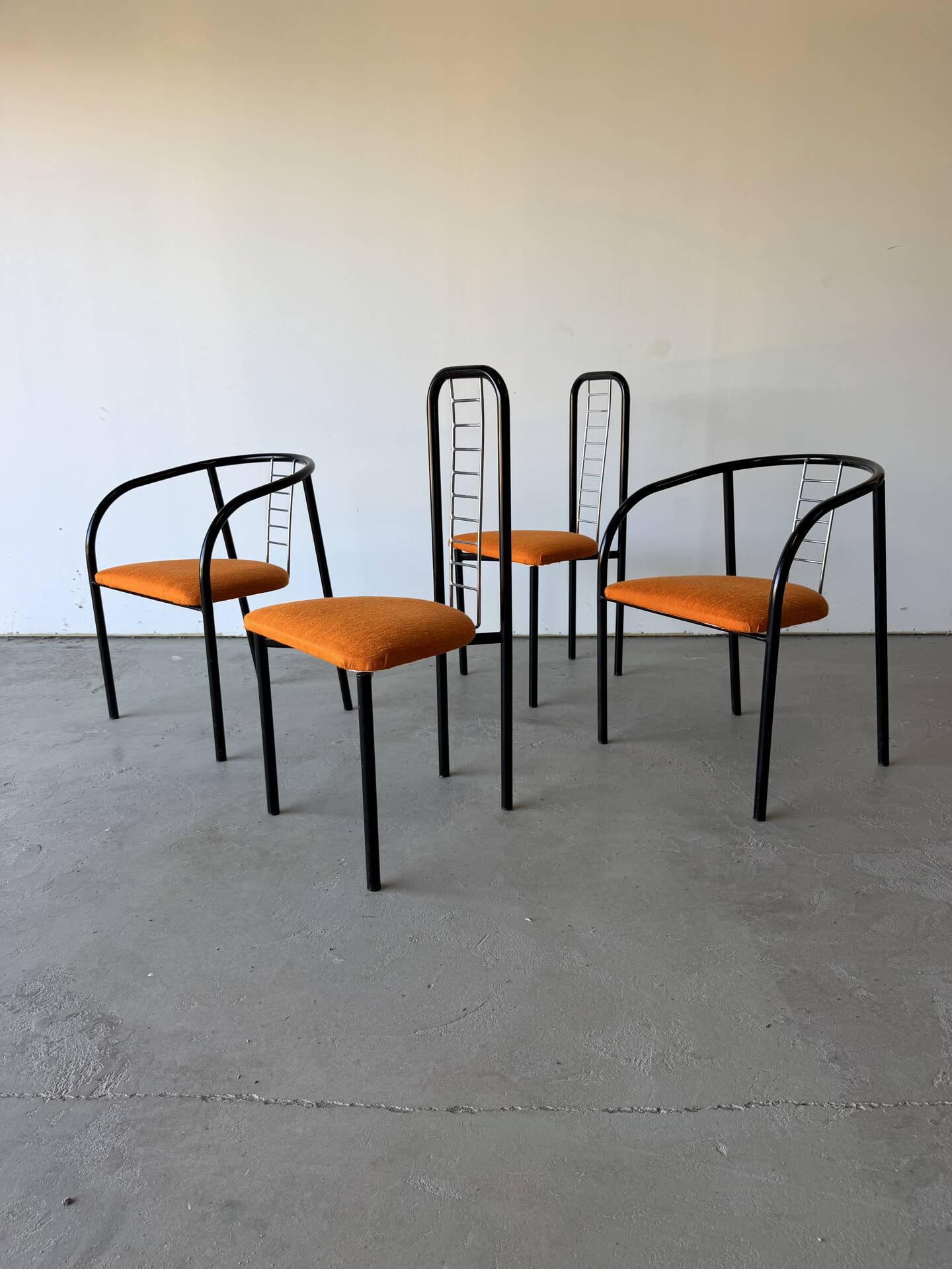 Set of 4 Italian design chairs in vintage black metal and chrome.