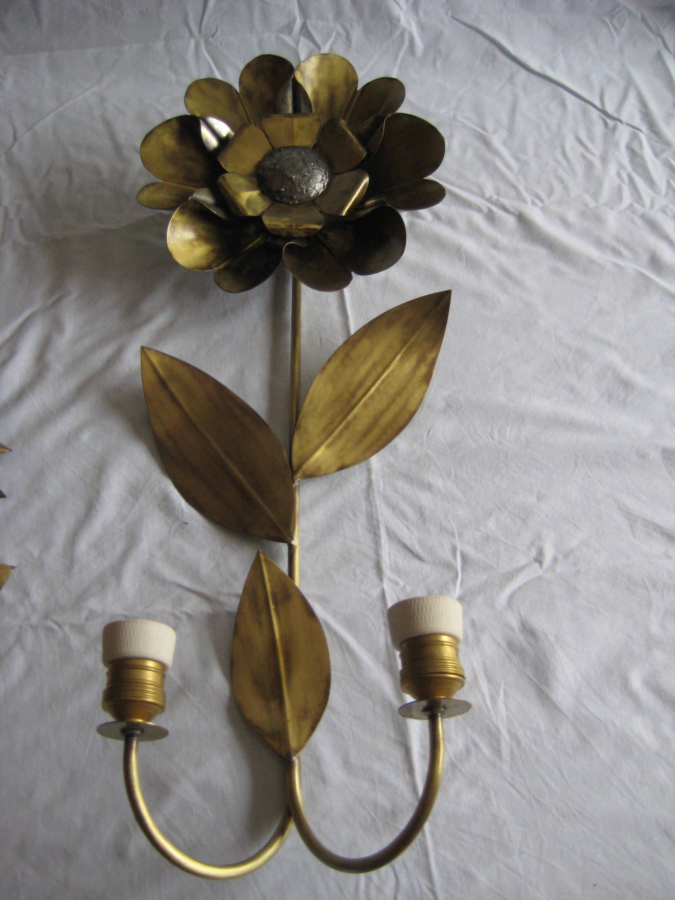 Brass sunflower sconces