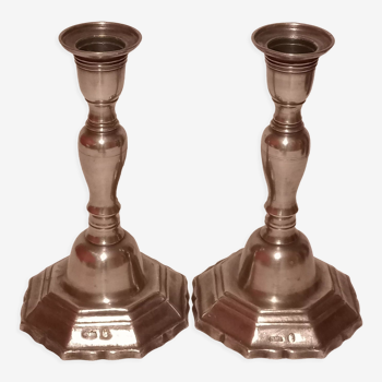 Old pair of tin candle holders