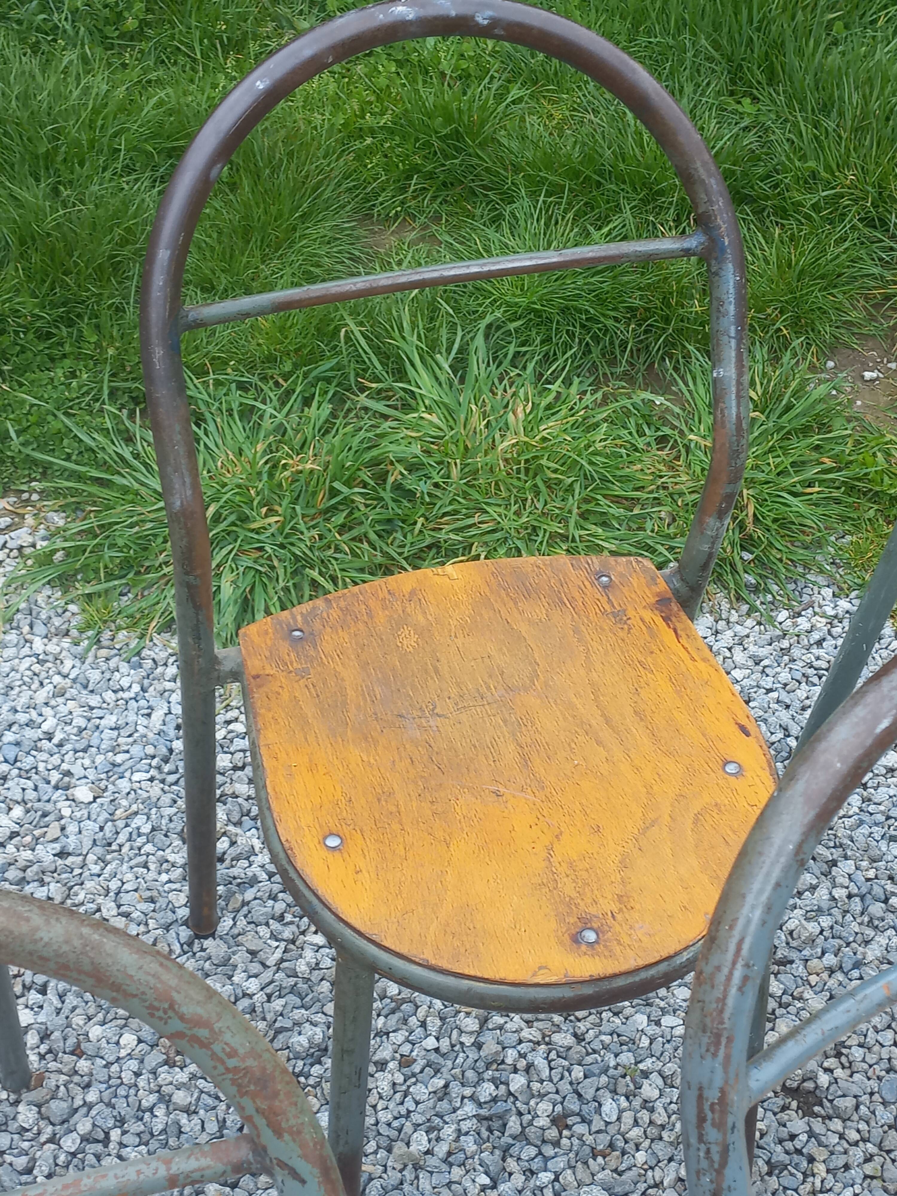 Set de 7 chaises de René Herbst métalliques assises bois