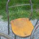 Set of 7 metal chairs by René Herbst with wooden seats.