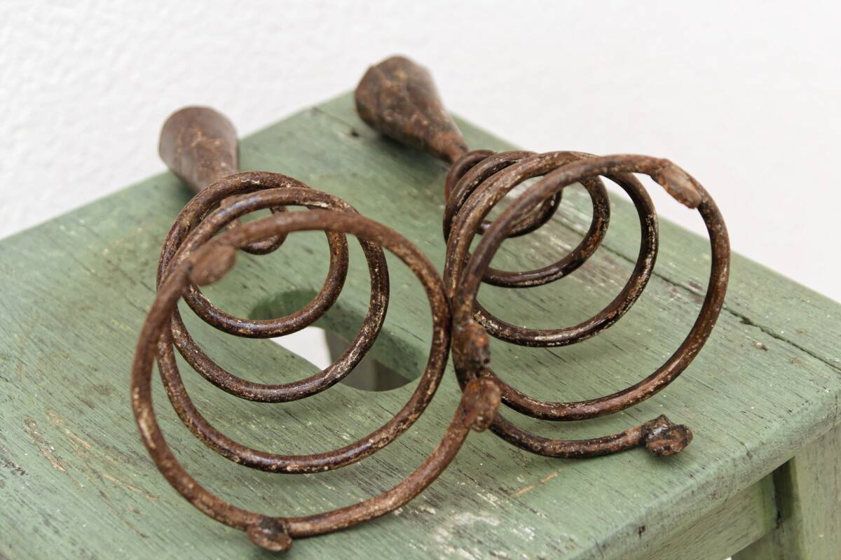 Pair of wrought iron spiral candlesticks