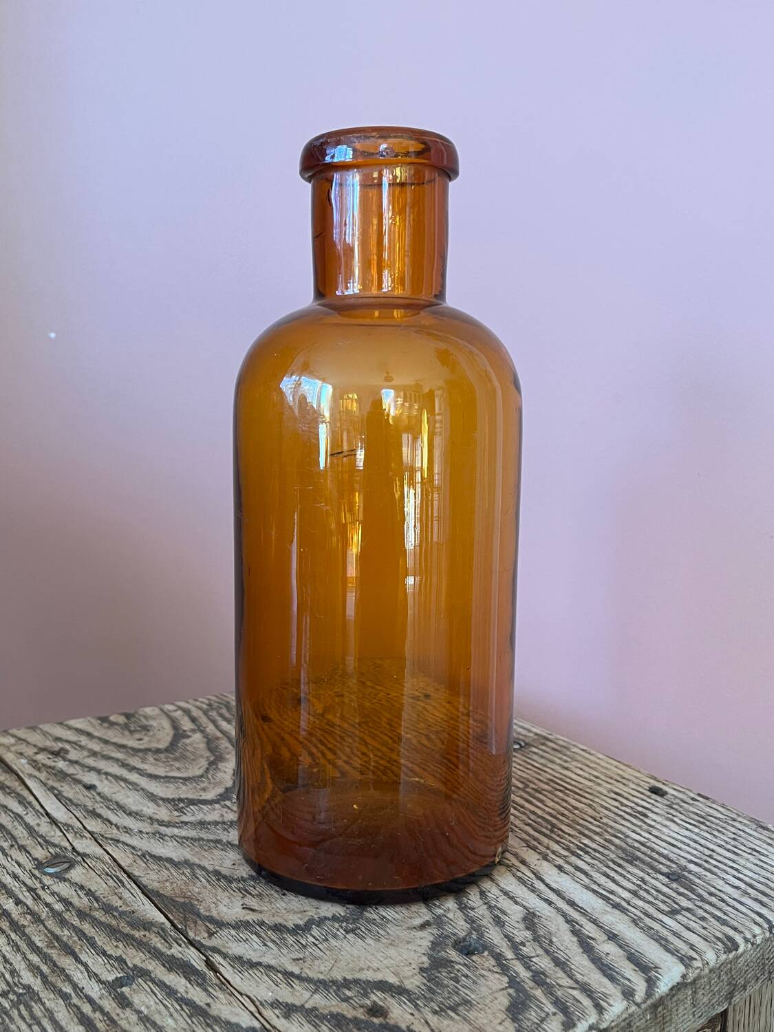 Amber glass bottle vase