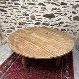 Oval coffee table in raw wood