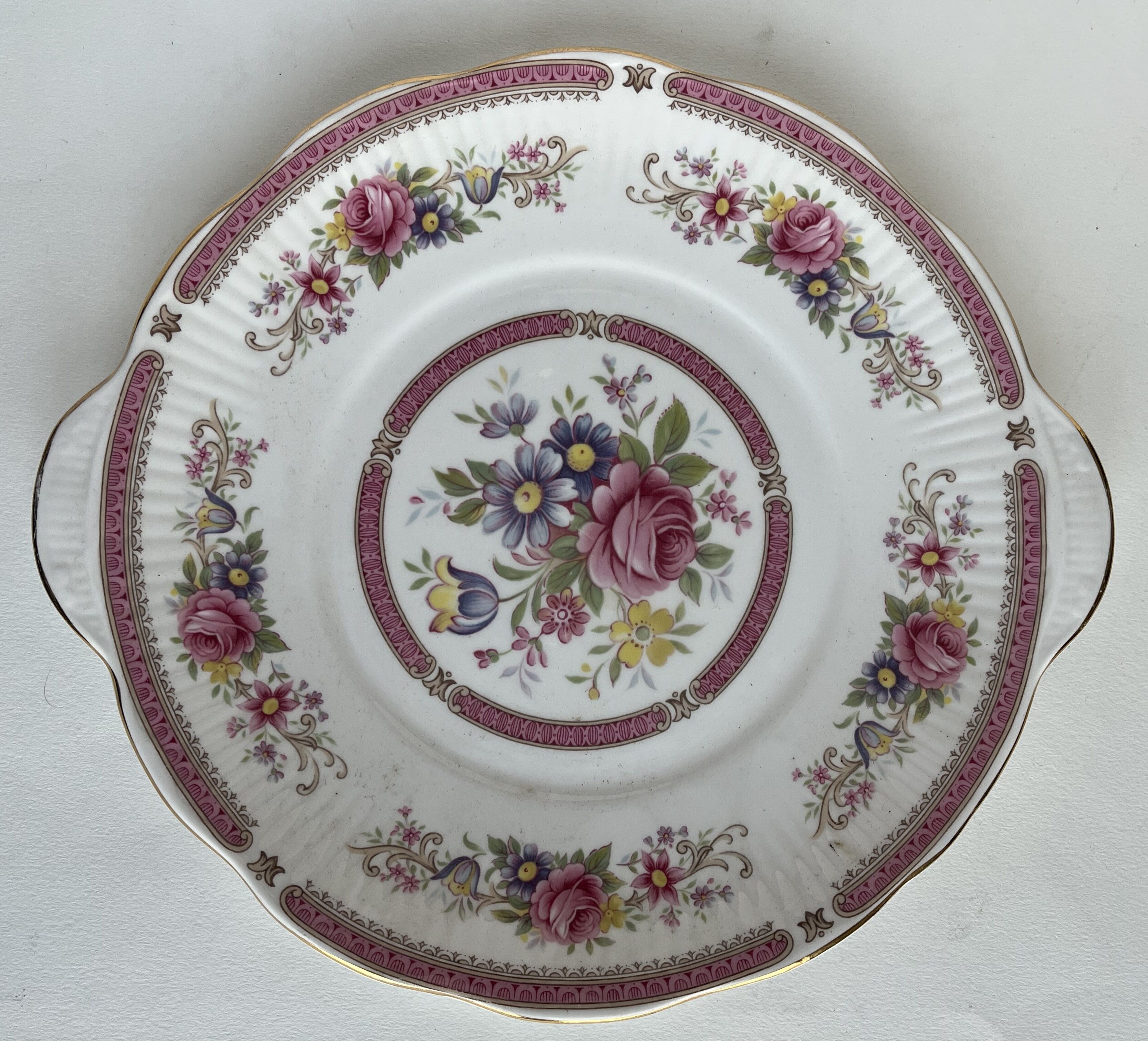 10 porcelain plates and a dish