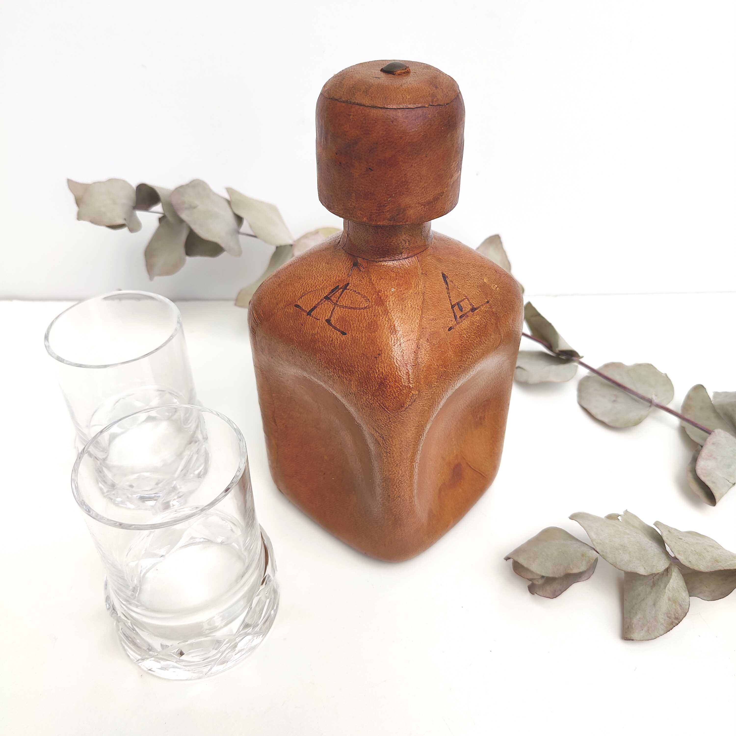 Vintage whisky decanter bottle glass and leather Havana color