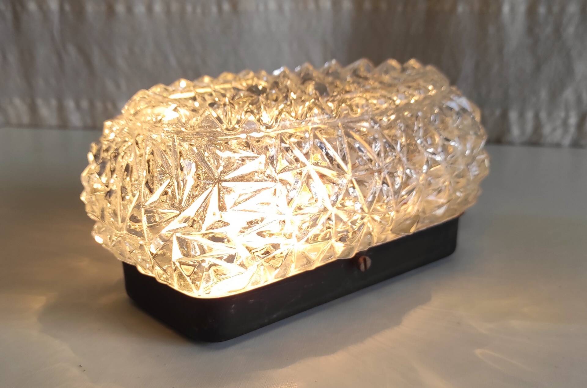 Ceiling light or oval wall light in moulded glass - mid 20th century.