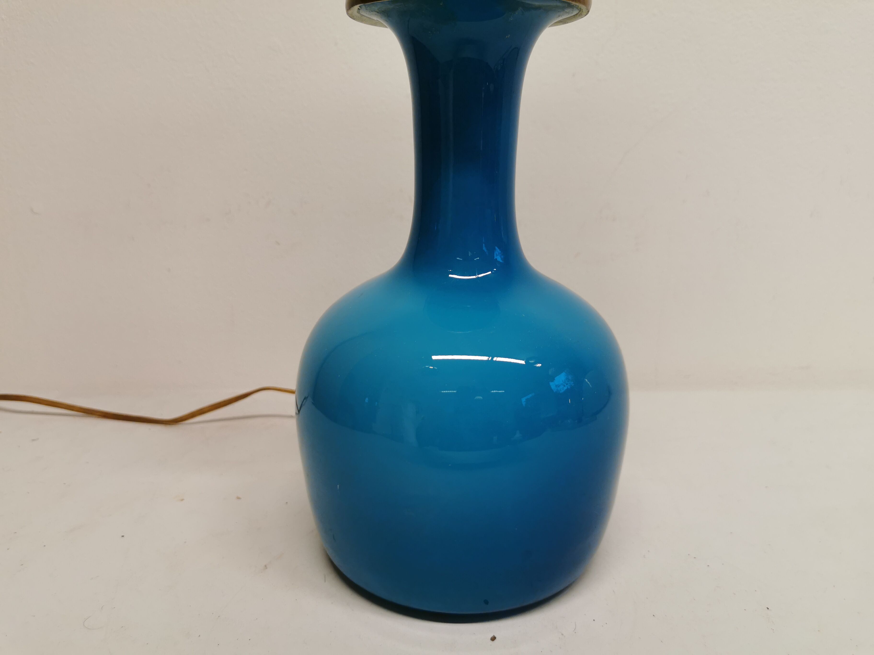 Sea blue glass lamp with brass top