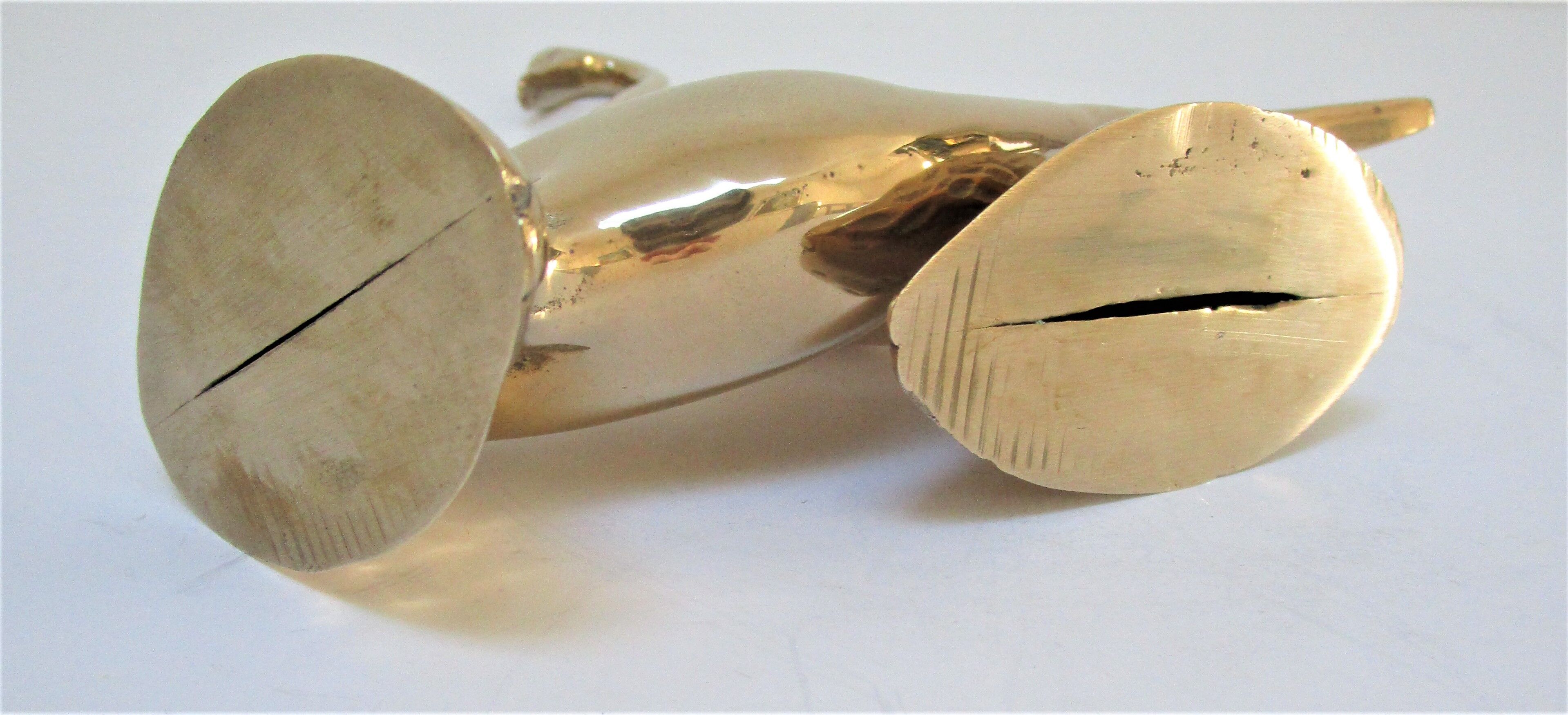 Pair of stylized birds in solid brass