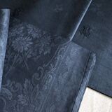 Lot four damasked and monogrammed towels linen and night blue silk