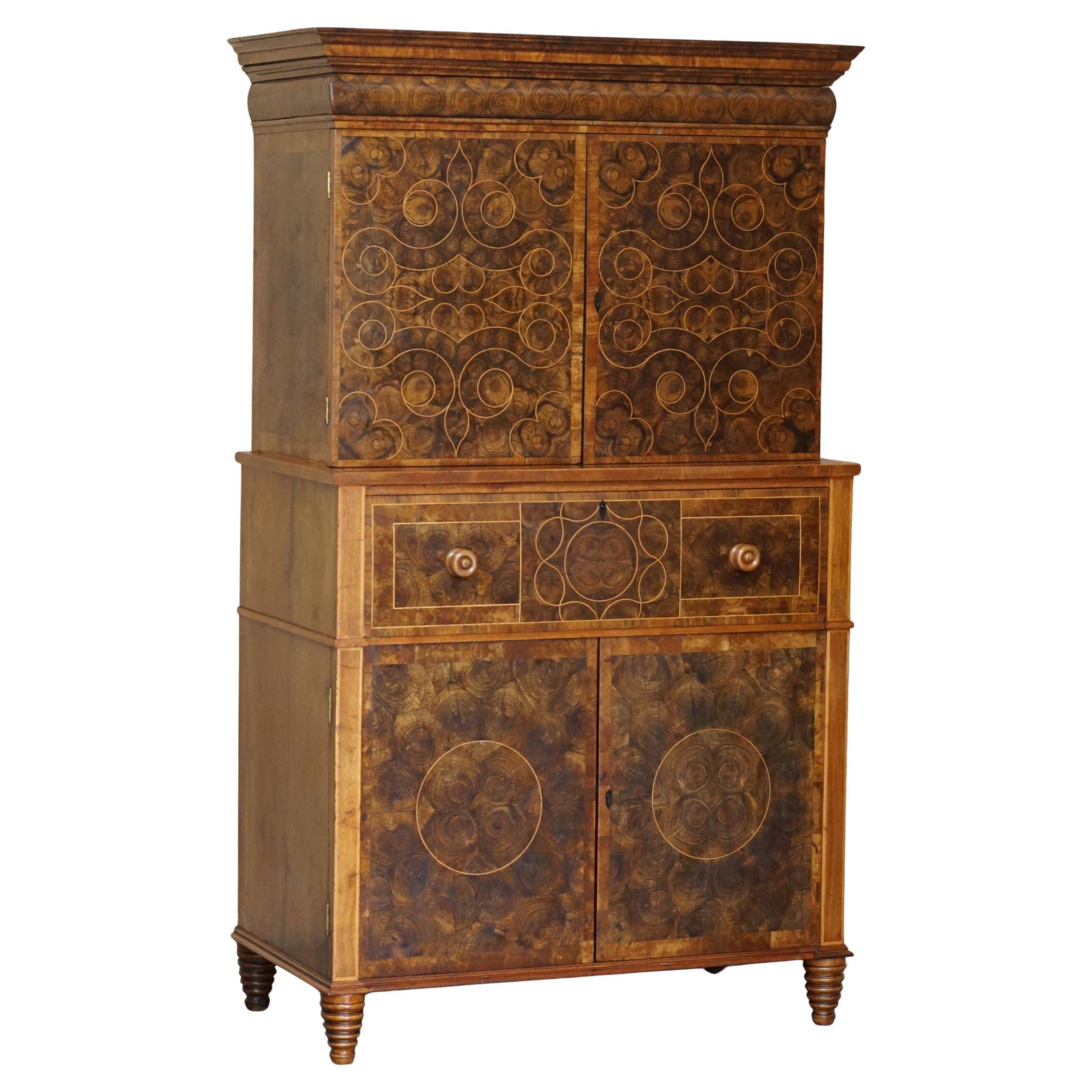 Queen Anne style pedestal commode from around 1710 in walnut and oyster veneer.