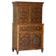 Queen Anne style pedestal commode from around 1710 in walnut and oyster veneer.