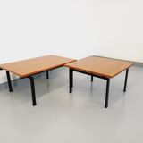 Suite of two vintage modernist Isa coffee tables in teak and black metal from the 60s