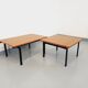 Suite of two vintage modernist Isa coffee tables in teak and black metal from the 60s