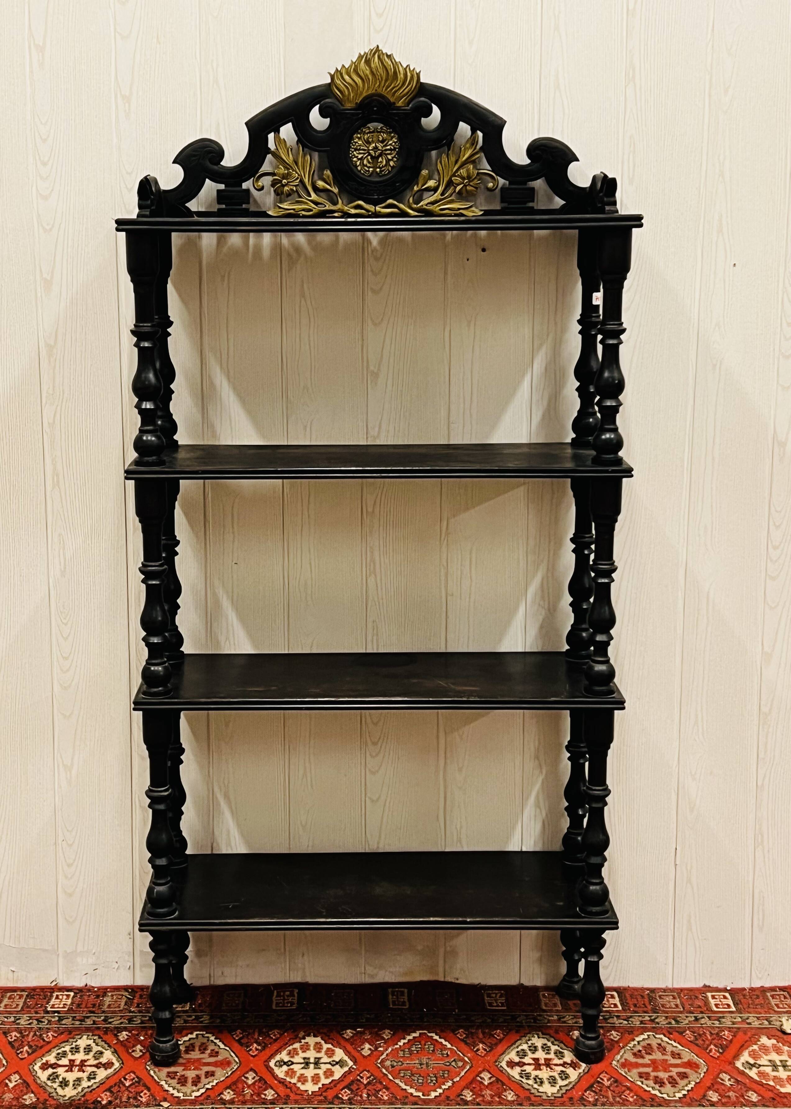 Blackened wooden shelf.