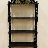 Blackened wooden shelf.