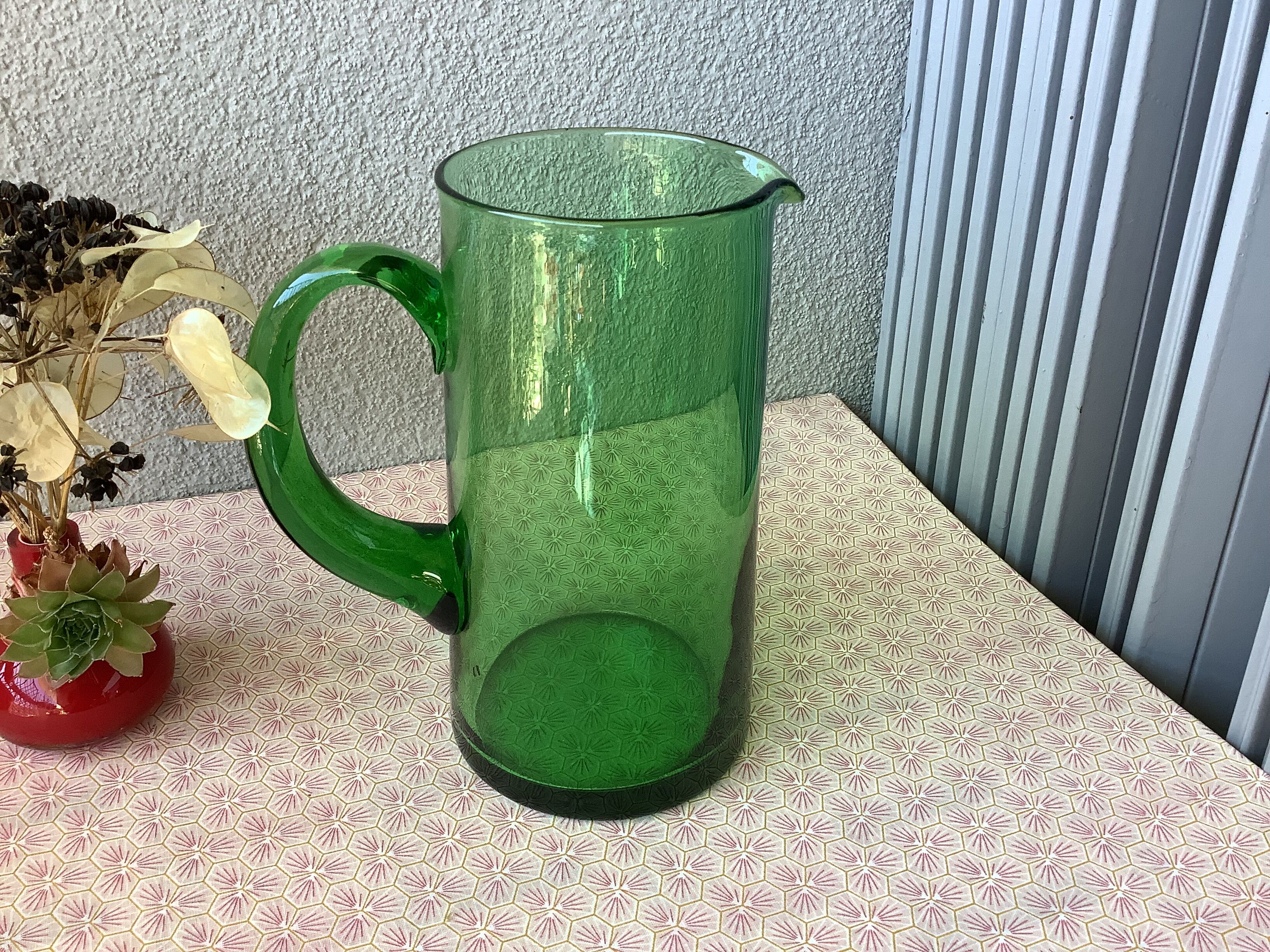 Green blown glass decanter