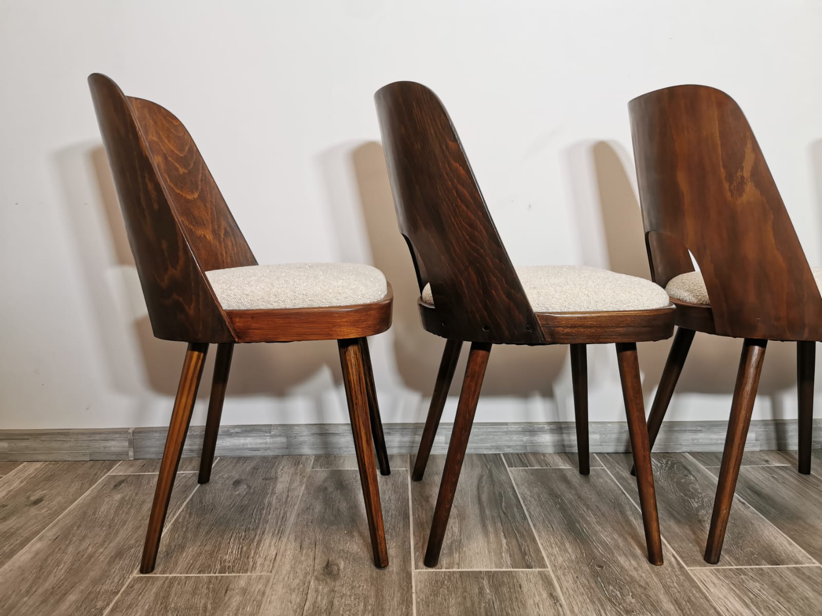 Dining chairs by Oswald Haerdtl