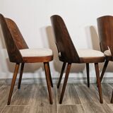 Dining chairs by Oswald Haerdtl