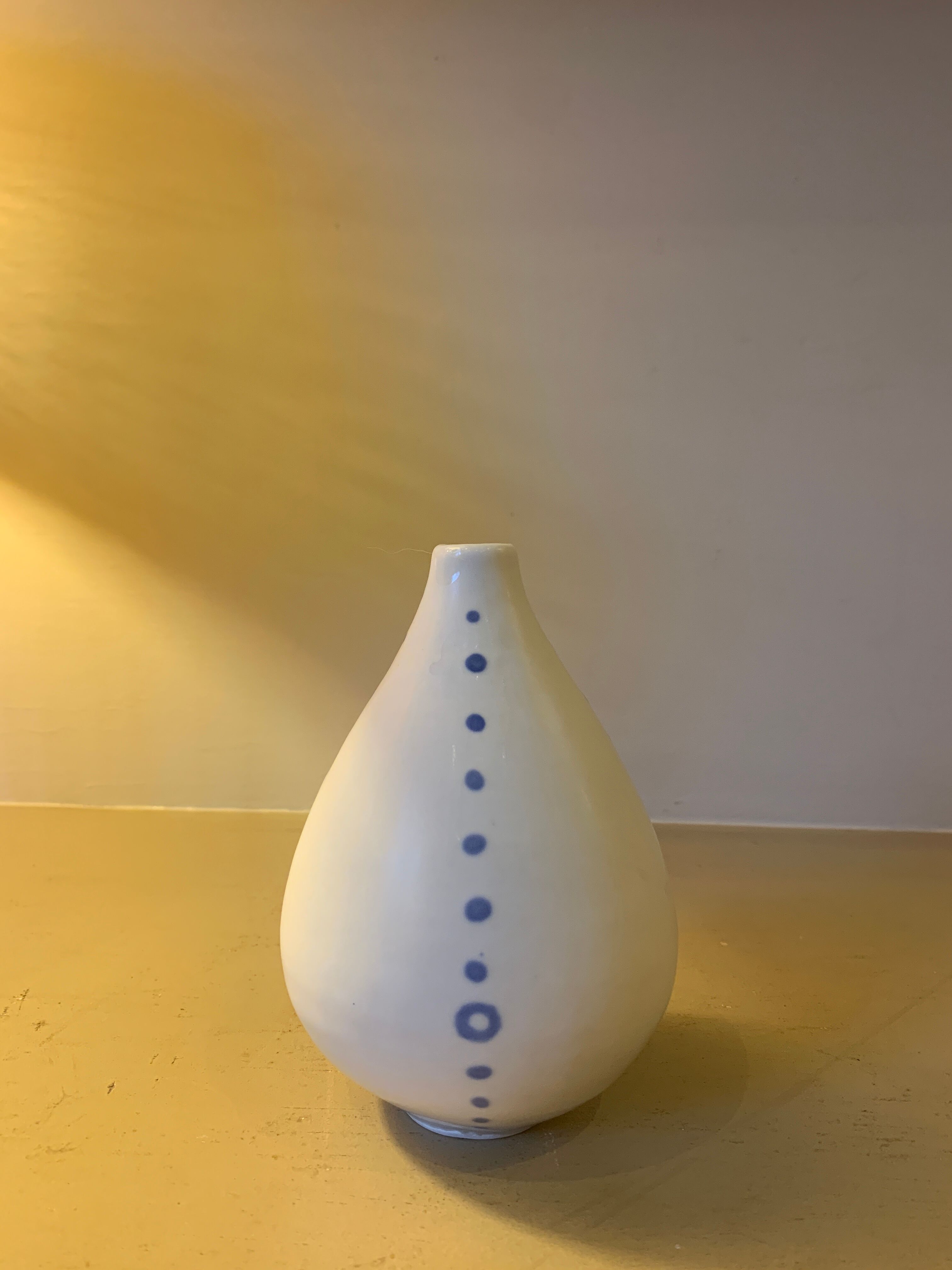 White ceramic with polka dots