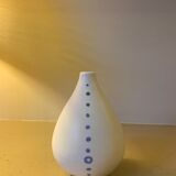 White ceramic with polka dots