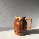 Small brown ceramic pitcher