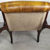 Pair of padded Chesterfield armchairs
