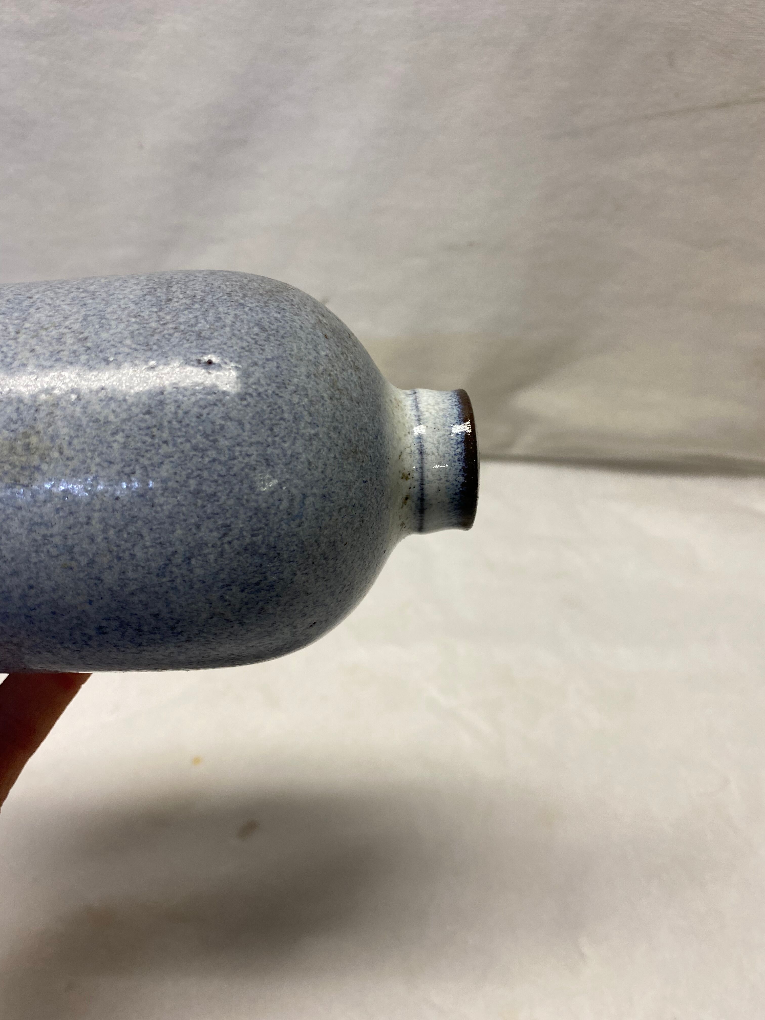 Bottle in bluish grey sandstone