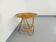 Round coffee table with 60's vintage rattan magazine tray