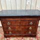 Renaissance period chest of drawers in flamed mahogany veneer