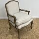 Fauteuil bergère en bois et lin naturel