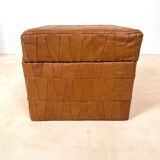 Storage pouffe in the "De Sede" style.