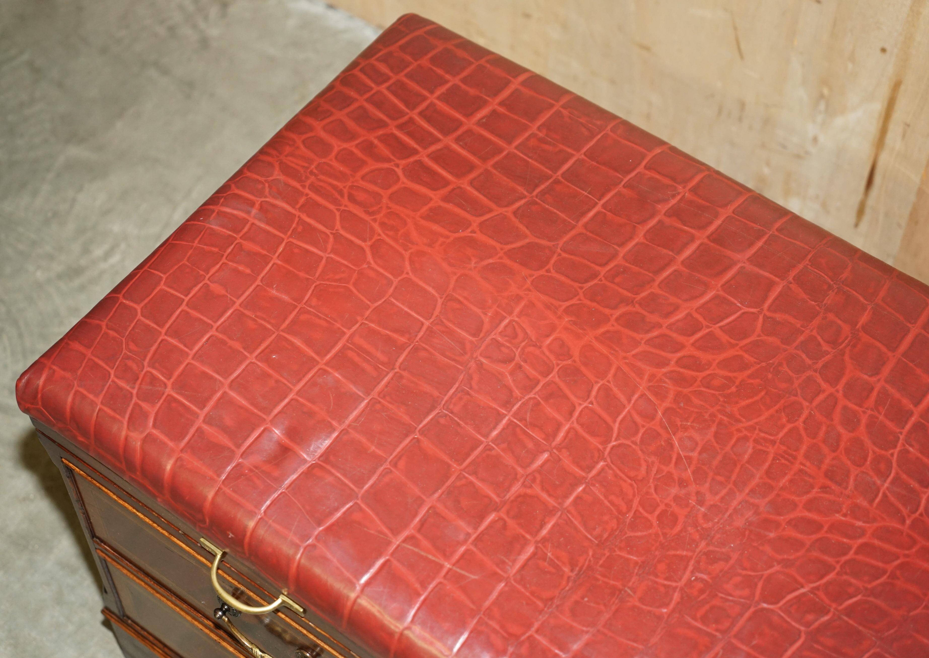 Crocodile leather and hardwood luggage rack in Mid-Century Modern style