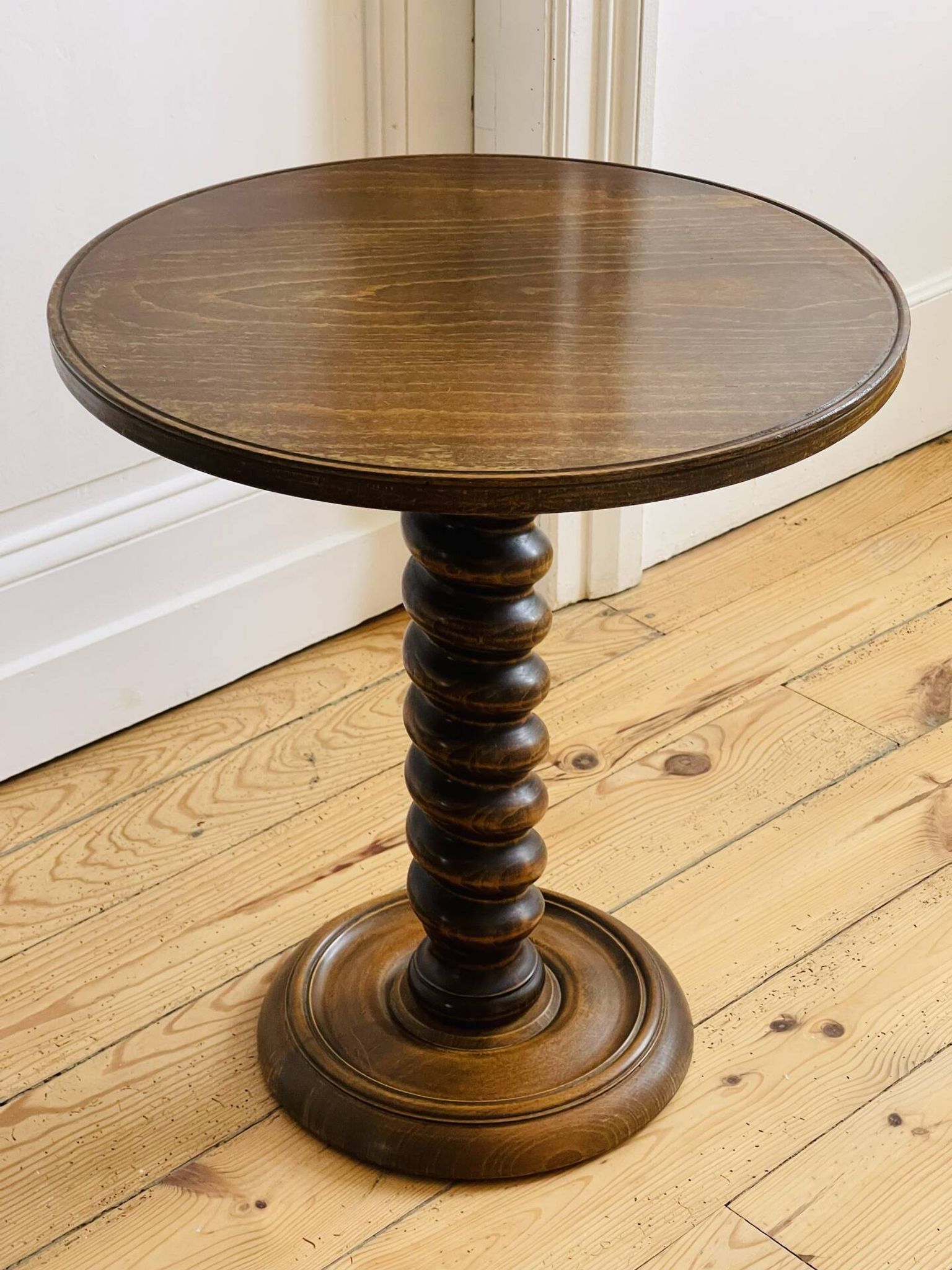 Turned wooden side table