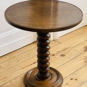 Turned wooden side table