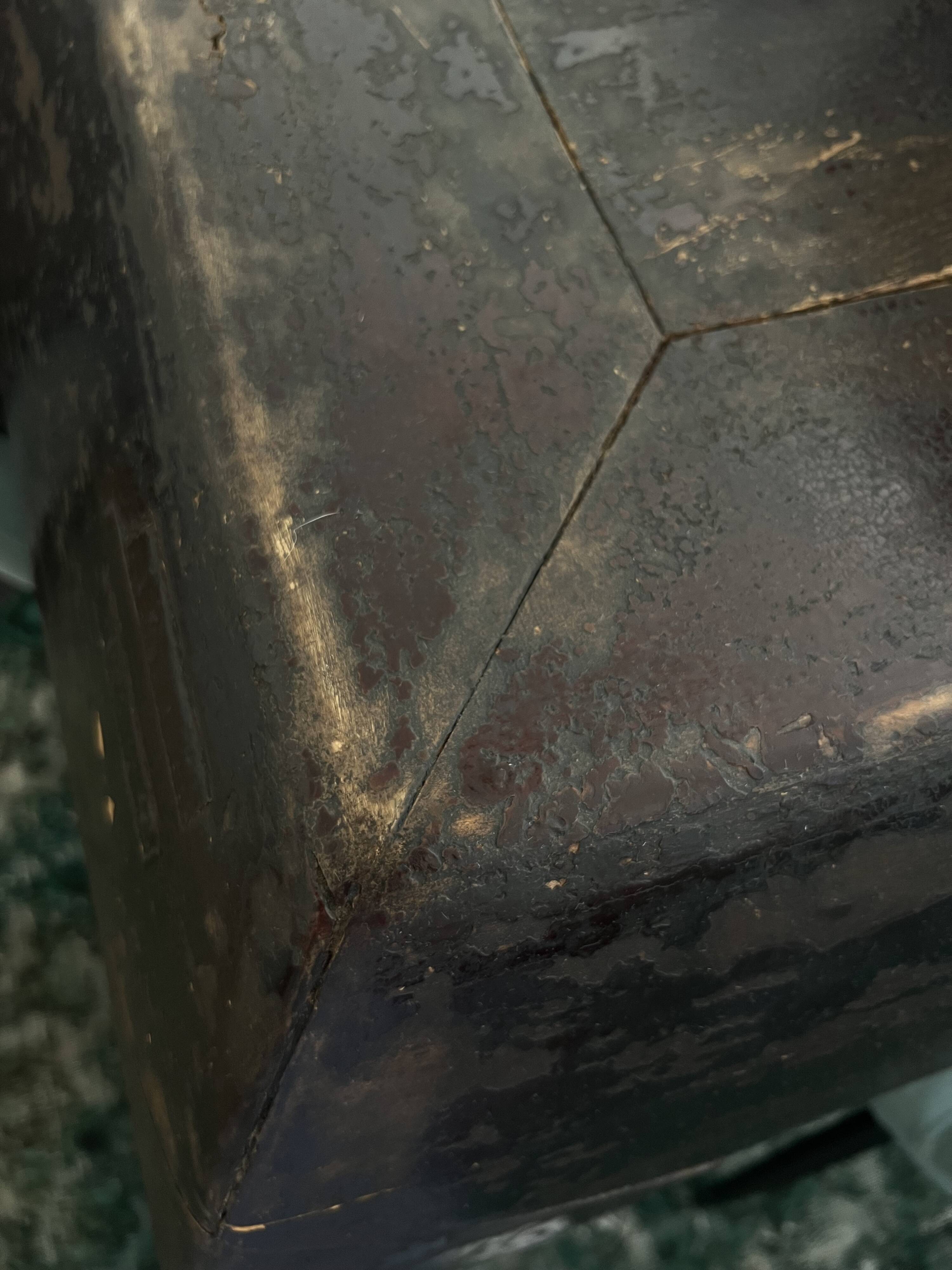 Large antique Chinese black table made of patinated solid wood.