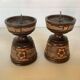 Pair of carved wooden candlesticks