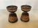 Pair of carved wooden candlesticks