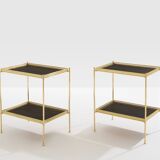 Pair of neoclassical side tables in brass and black leather by Maison Jansen, 1960.